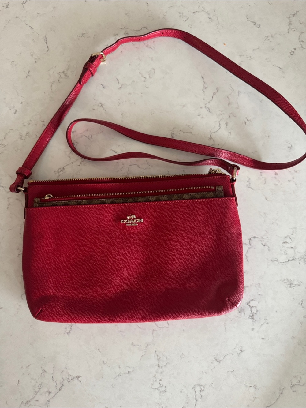 Coach Red Pebbled Leather Crossbody Bag with Additional Zippered Case.